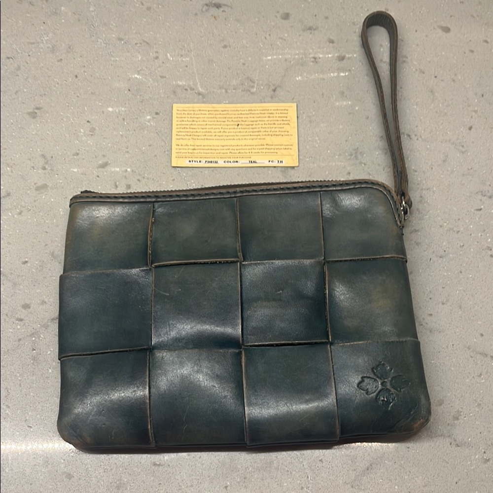 Patricia, Nash Cassini leather wristlet in teal
